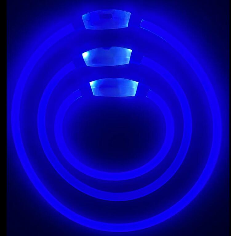 Set of three blue illuminated light up dog collars in small, medium, and large sizes nested together high visibility safety collars for walking in low light.