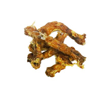 Pile of natural chicken necks dog chews high protein low fat air dried treats for teeth and gums and satisfying long lasting chewing.