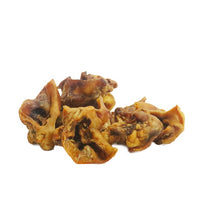 Group of natural pork crunch dog chews high protein low fat crunchy treats for teeth and gums and chewing enrichment.